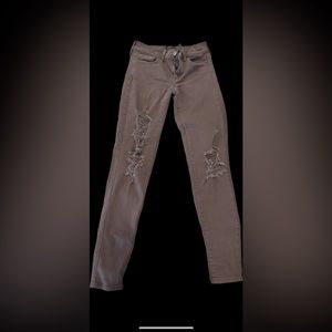 American Eagle Super Stretchy Mauve Skinny Distressed Jeans
